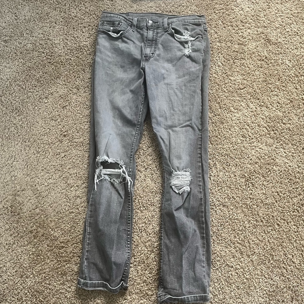Ripped dark grey jeans